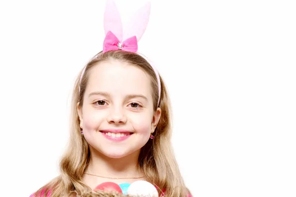 Small happy baby girl with easter eggs isolated on white — Stock Photo, Image