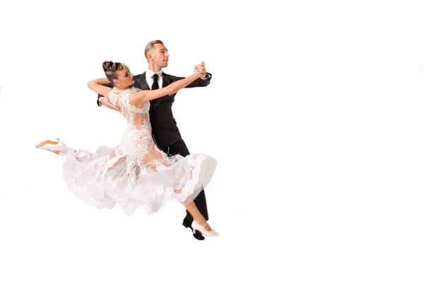 Ballrom dance couple in a dance pose isolated on white bachground — Stock Photo, Image