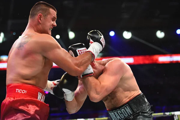 An unidentified boxers in the ring during fight for ranking points — Stock Photo, Image