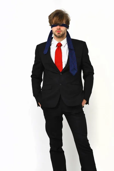 Bearded macho stylish man in elegant suit with blindfold eyes — Stock Photo, Image