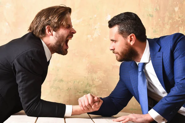 Lawyers arm wrestling