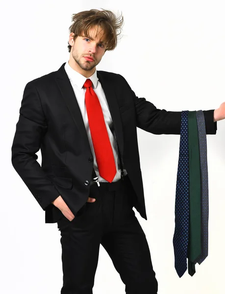 Bearded macho stylish man in elegant suit with ties — Stock Photo, Image