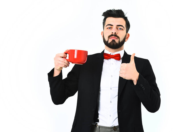 Bearded man, caucasian hipster with moustache and red mug