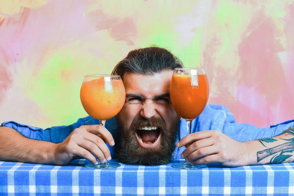 Brutal caucasian hipster with moustache between tropical alcoholic fresh cocktails — Stock Photo, Image