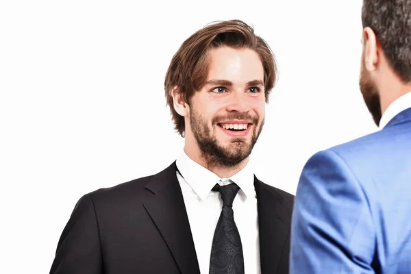 Happy men in jacket speaking with businessman — Stock Photo, Image