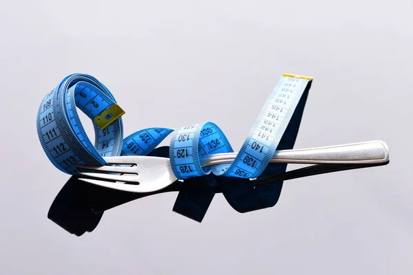 Vork gordel met blauwe meetlint — Stockfoto
