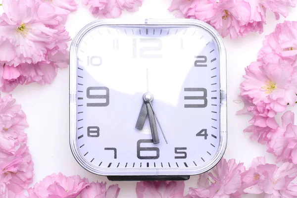 Alarm clock with big numbers in white colour, modern style