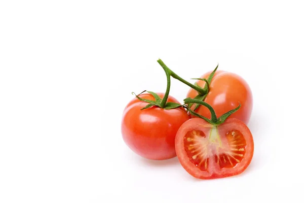 Vegetarian healthy concept with tomatoes isolated on white — Stock Photo, Image