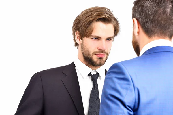 Aggressive men in jacket speaking with businessman — Stock Photo, Image