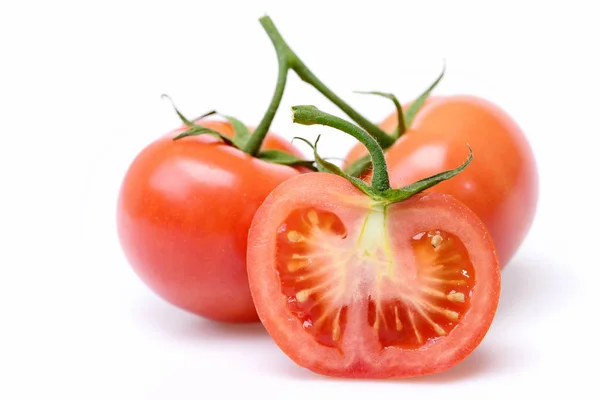 Estilo de vida conceito saudável com tomates isolados em branco — Fotografia de Stock