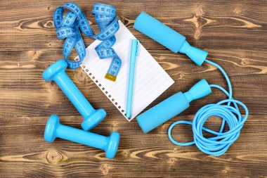 defter, atlama ipi ve halter, santimetre, spor programı kavramı