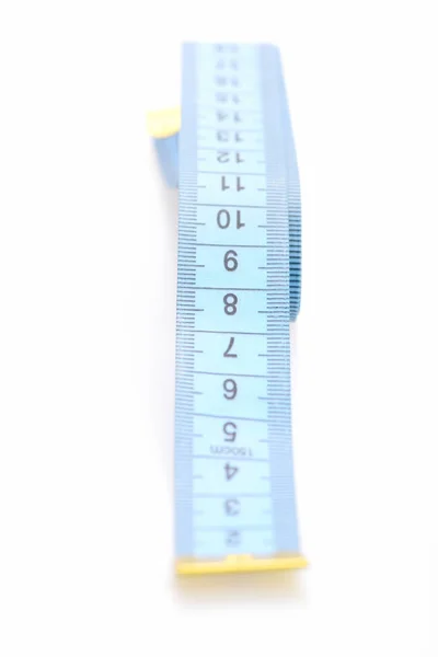 Tape for measuring in blue color with black numbers Stock Picture