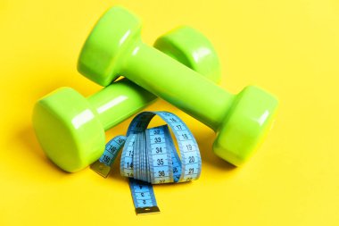 dambıl ve ölçüm bandı ile sağlık kavramı