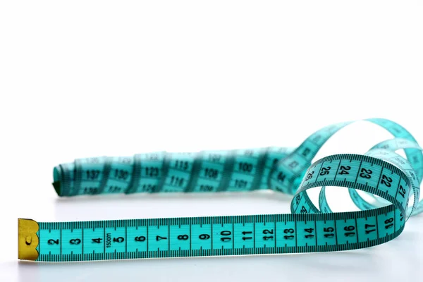 Tape for measuring in cyan color with metallic end — Stock Photo, Image