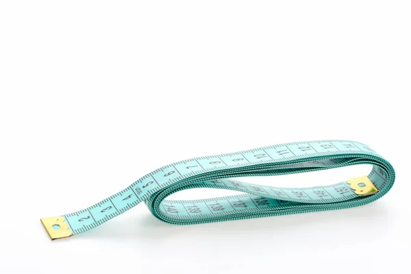 Tape for measuring in cyan color folded — Stock Photo, Image