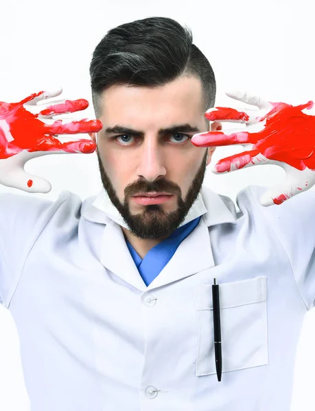 Doctor in white coat shows blood on his hands — Stock Photo, Image