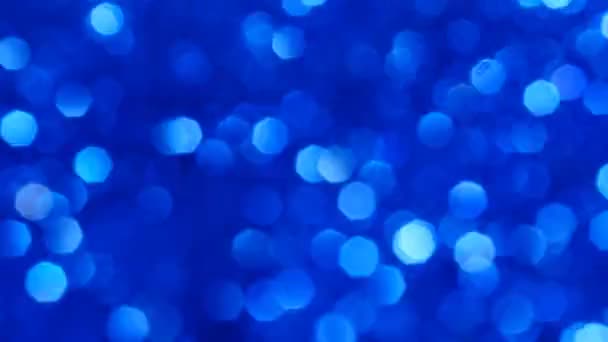 Funkelnde abstrakte Bokeh blaue Farbe Hintergrund mit glitzernden Kreisen, 4k — Stockvideo