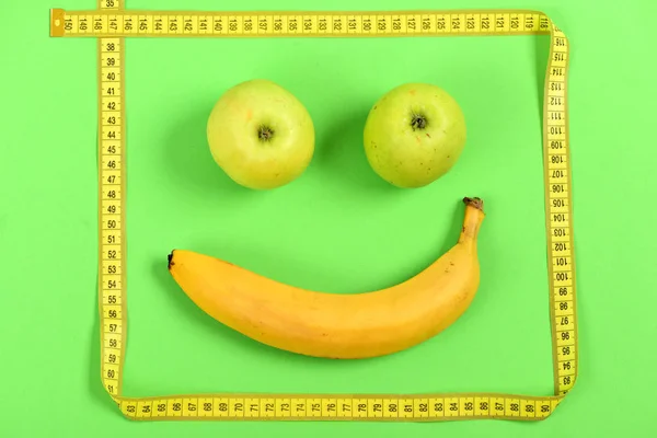 Face with smiling happy expression made of fruit — Stock Photo, Image