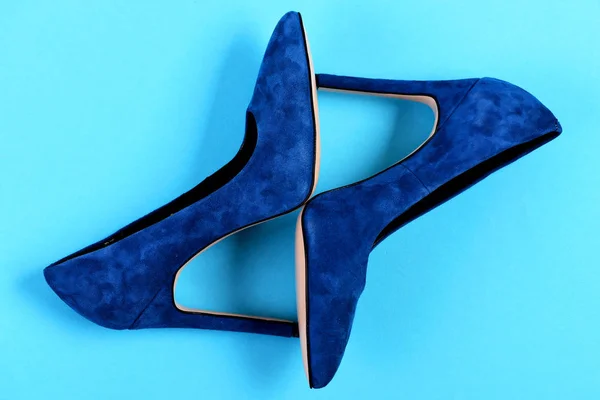 High heel footwear isolated on cyan blue background — Stock Photo, Image