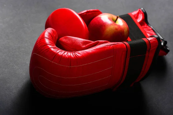Professional box fight and dieting concept. Boxing gloves in red