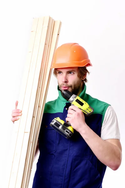 Bauarbeiter in orangefarbenem Helm und Uniform. Fertiggestellte Arbeiten, Baukonzept — Stockfoto