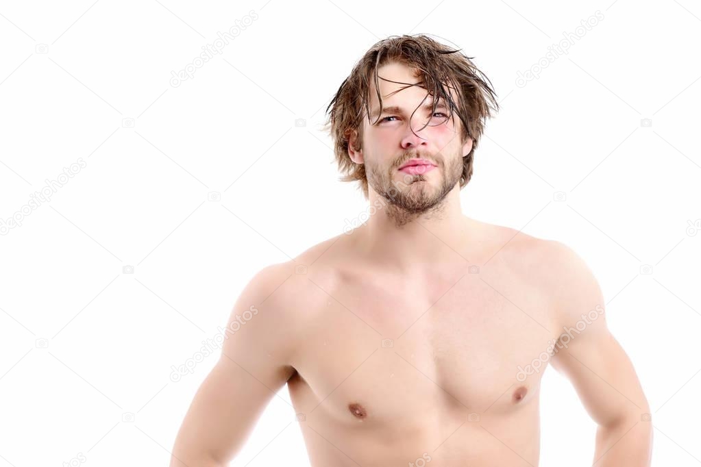 Man with naked torso, passionate face, beard and messy hair