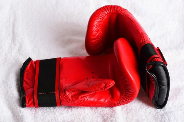 Duet of red gloves for boxing made of leather