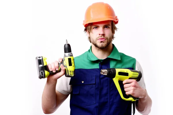 Bauarbeiter hält gelbe Bauwerkzeuge in der Hand. fertig gestellte Arbeit — Stockfoto