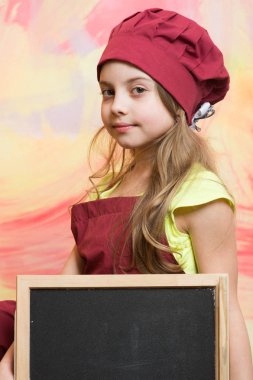 Şef çocuk önlük renkli arka plan üzerinde.