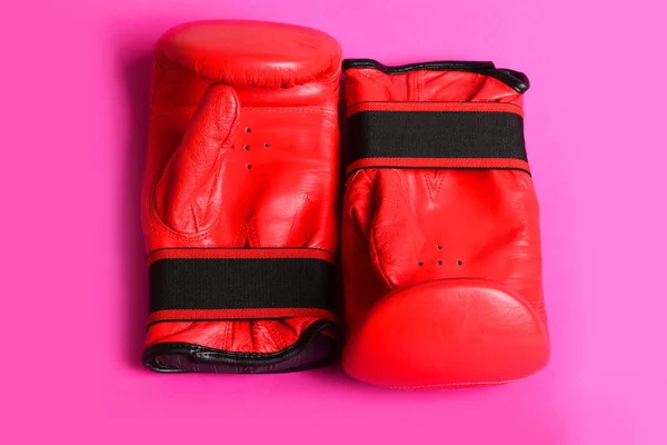 Two gloves for boxing and thai martial arts in red