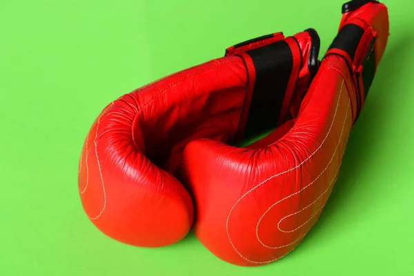 Sport equipment isolated on green background. Pair of boxing sportswear — Stock Photo, Image