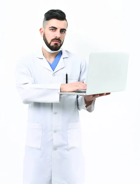 Man with serious face in white hospital gown. Treatment technologies — Stock Photo, Image