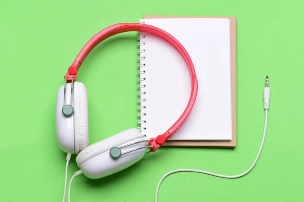 Headset for music and blank page. Headphones in white, red