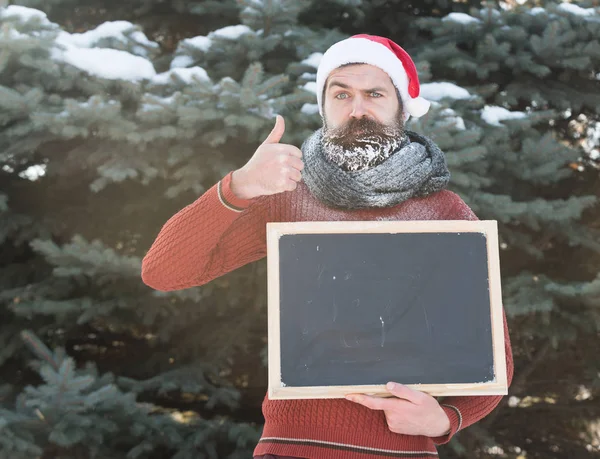 Frons santa met blanco schoolbord — Stockfoto