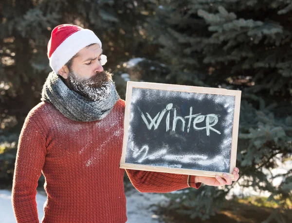 Man santa with chalkboard — Stock Photo, Image