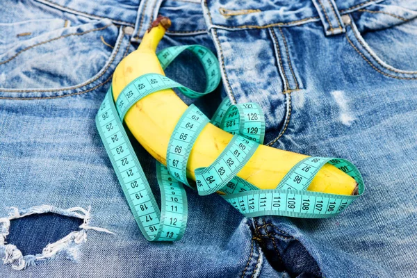 Denim pants crotch with banana imitating male genitals, close up — Stock Photo, Image