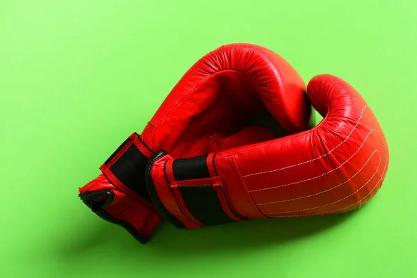 Sport equipment isolated on bright green background. Boxing gloves — Stock Photo, Image