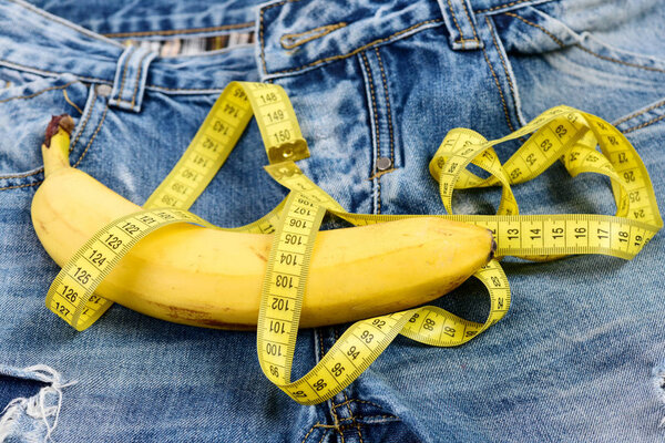 Mens denim pants crotch with banana imitating male genitals