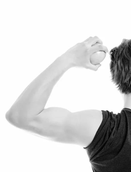 Chico con grandes músculos sostiene manzana verde en su mano —  Fotos de Stock