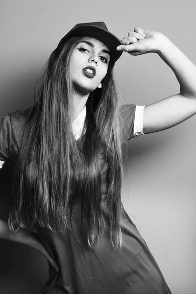 Serious colorful girl with cap — Stock Photo, Image