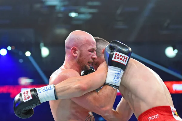 An unidentified boxers in the ring during fight for ranking points — Stock Photo, Image