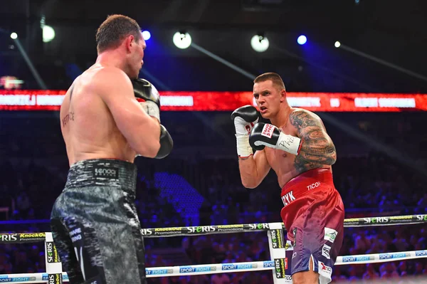 An unidentified boxers in the ring during fight for ranking points — Stock Photo, Image