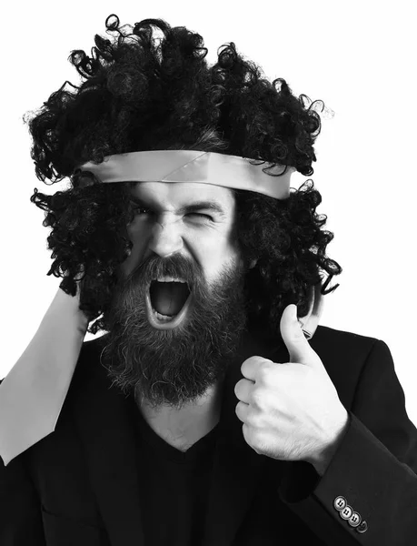 Caucasian hipster in suit and black curly tie-tied afro wig — Stock Photo, Image