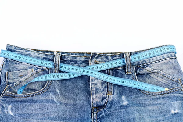 Jeans top part with measure tape solated on white background — Stock Photo, Image