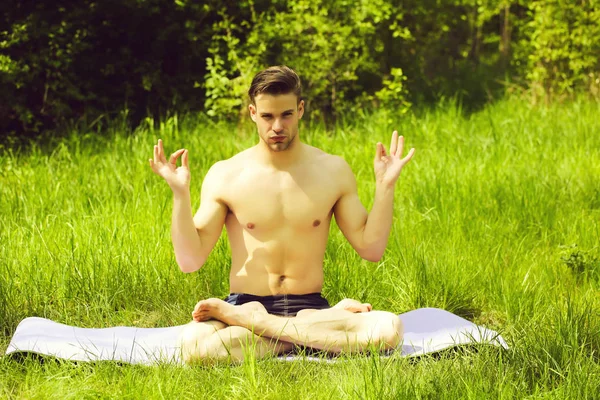 Concept of yoga presented by man with naked torso