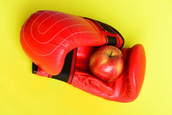 Professional box fight and dieting concept. Boxing gloves in red