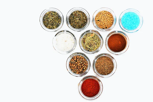 Various spices in jars on white background — Stock Photo, Image