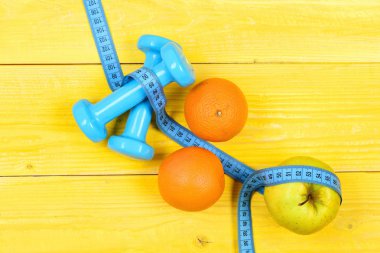 spor eğitim kavramı, halter kilo meyve sarı vintage tarih ile