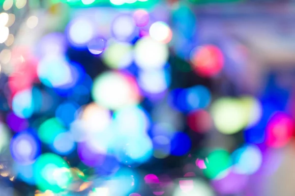 Abstrakte Lichter mit Bokeh-Effekt auf bunt verschwommenem Hintergrund verwischen — Stockfoto