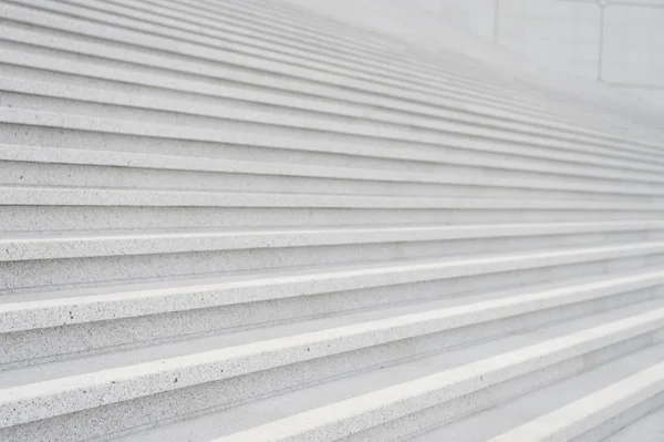 Stairway with concrete stairs on grey background in Paris, France